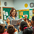 Poetry: In a classroom bright with eager eyes,  A teacher stands, where knowledge flies,  Her voice, a...